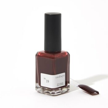 Dark red nail polish bottle with sample swatch | Available at budcosmetics.com
